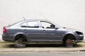 Car jacked with wheels removed stolen during crime rate increase