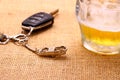 Car key with accident and beer mug Royalty Free Stock Photo