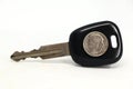 Car key with coin. Royalty Free Stock Photo