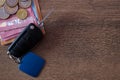 Car key and euro money on wooden desk Royalty Free Stock Photo