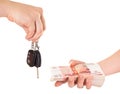 Car key in hand and cash money Royalty Free Stock Photo