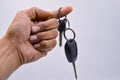 Car key holder  white background concept rent a car pawn car buy a car sell a car insurance Royalty Free Stock Photo