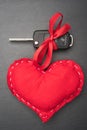 Car key with red bow and a heart Royalty Free Stock Photo