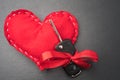 Car key with red bow and a heart Royalty Free Stock Photo