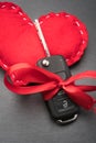 Car key with red bow and a heart Royalty Free Stock Photo