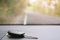 Car key ring and remote control key in vehicle interior. forget put on front of the car. Royalty Free Stock Photo