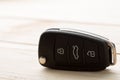 Car key and security remote on the table, concept for rent or buy a new car Royalty Free Stock Photo