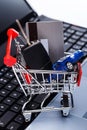 Car and key in shopping trolley Royalty Free Stock Photo