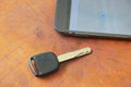 car key and smart phone opened map on table Royalty Free Stock Photo