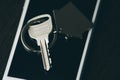 Car key with smartphone isolated on dark background.Key Royalty Free Stock Photo