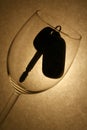 Car key in a wine glass, drunk driver Royalty Free Stock Photo