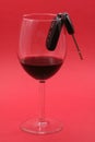 Car key in a wine glass, drunk driver Royalty Free Stock Photo