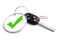 Car keys with approved tick symbol on key ring. Concept for appr Royalty Free Stock Photo