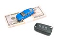 Car keys, blue car and money Royalty Free Stock Photo