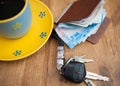 Car keys, coffee Cup and wallet. Royalty Free Stock Photo