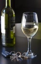 Car keys and a glass of cold wine Royalty Free Stock Photo