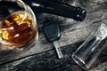 Car keys on the table with alcohol drink, fallen flask and fallen glass, drive under alcohol influence concept Royalty Free Stock Photo