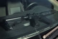 Car left on public with automatic handgun visible behind front window Royalty Free Stock Photo