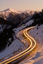Car light in night on ice road Royalty Free Stock Photo