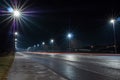 Car light trail and city light. Night shot. Vehicle back lights illumination on highway