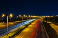 Car light trail on the road at night. Long exposure shot of city light trails captured from Meydan Bridge .