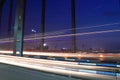 Car light trails across the bridge Royalty Free Stock Photo