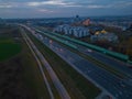 Car light trails in the city intersection, Traffic. Video. Top Down Aerial Drone view of a road at night with cars driving, Royalty Free Stock Photo