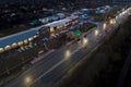 The car light trails in the city street Traffic. Top Down Aerial Drone view of a road at night Royalty Free Stock Photo