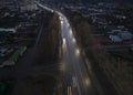 The car light trails in the city street Traffic. Top Down Aerial Drone view of a road at night i Royalty Free Stock Photo