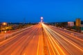 Car light trails on highway street or road in Bangkok, Thailand. Urban city at night in transportation, business, or technology Royalty Free Stock Photo