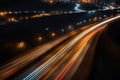 Car light trails on the road at night. Long exposure photo.