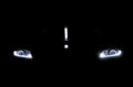 Car lights in the dark Royalty Free Stock Photo