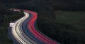 Car lights driving on the freeway at night Royalty Free Stock Photo