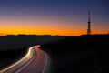 Car lights at night towards the city Royalty Free Stock Photo