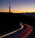 Car lights at night towards the city Royalty Free Stock Photo