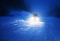 Car lights in winter forest Royalty Free Stock Photo