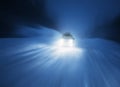 Car lights in winter forest Royalty Free Stock Photo