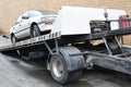 Car loaded on tow truck Royalty Free Stock Photo