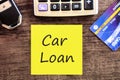 Car loan concept with text,calculator and credit card and car key ,calculating for debt payment background Royalty Free Stock Photo