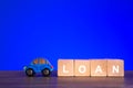 Car loan or vehicle rental concept with blue background Royalty Free Stock Photo