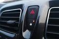 A car lock button and status light and emergency stop button in car interior Royalty Free Stock Photo
