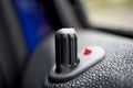 Car locking stick in older passenger car providing the lock of the vehicle as a symbol of security, safety, precaution and prot Royalty Free Stock Photo