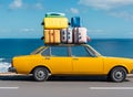 Car with luggage on the roof ready for summer vacation Royalty Free Stock Photo