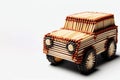A car made of matches on a light background. Space for text. Royalty Free Stock Photo