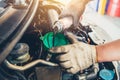 Car maintenance change oil and filling engine lube