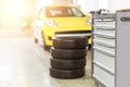 Car maintenance and service center. Vehicle tire repair and replacement equipment. Seasonal tire change Royalty Free Stock Photo