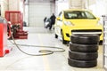 Car maintenance and service center. Vehicle tire repair and replacement equipment. Seasonal tire change Royalty Free Stock Photo