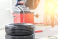 Car maintenance and service center. Vehicle tire repair and replacement equipment. Seasonal tire change Royalty Free Stock Photo