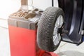 Car maintenance and service center. Vehicle tire repair and replacement equipment. Seasonal tire change Royalty Free Stock Photo