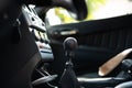 Car manual leather gear lever knob. Close up shot, selective focus, no people, generic car